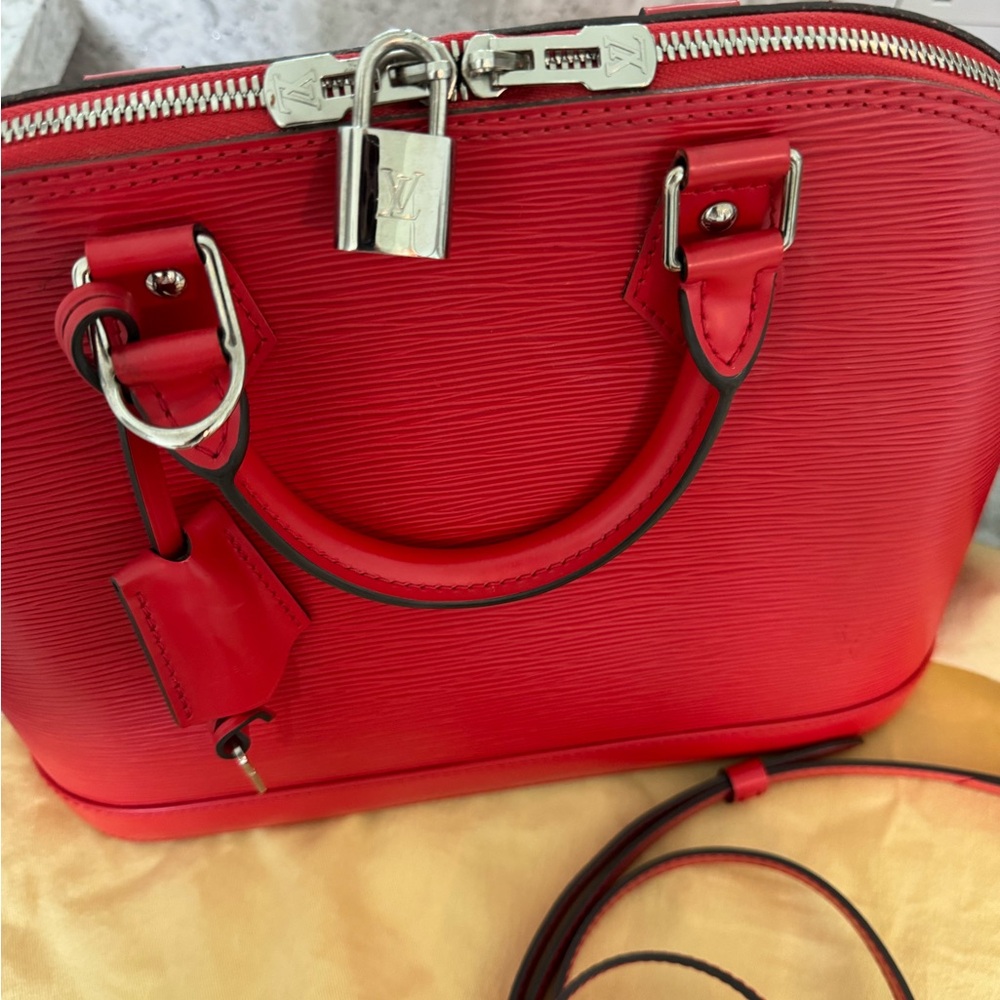 Authentic Louie Vuitton alma epi leather red